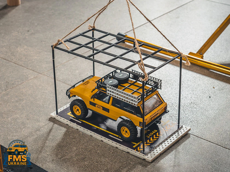 Машинка на радіокеруванні FMS 1:24 FCX24M Land Rover DISCOVERY Camel Trophy Edition RTR FMS12483RTRYL фото