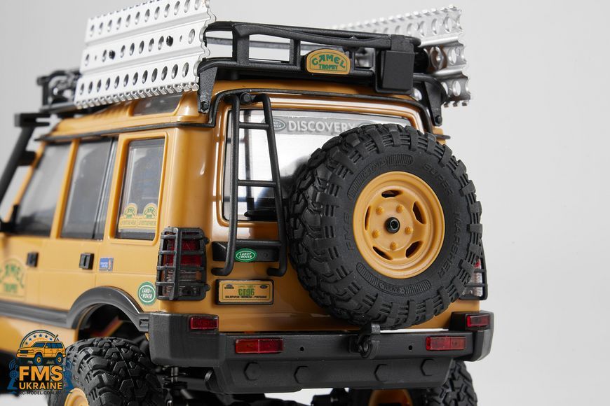 Машинка на радіокеруванні FMS 1:24 FCX24M Land Rover DISCOVERY Camel Trophy Edition RTR FMS12483RTRYL фото