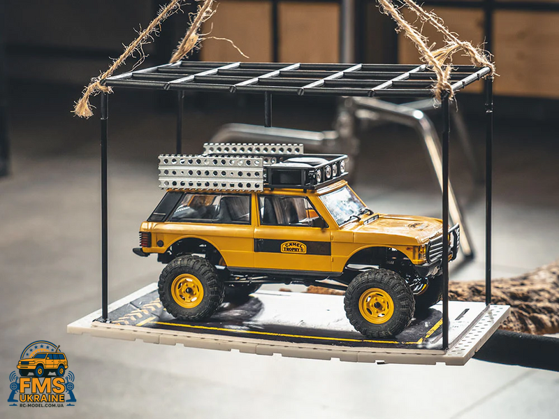 Машинка на радіокеруванні FMS 1:24 FCX24M Land Rover DEFENDER 90 Camel Trophy Edition RTR  FMS12491RTRYL фото