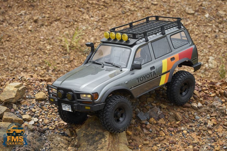 Машинка на радіокеруванні FMS 1:10 FCX10 LC80 Toyota Land Cruiser 80 RTR FMS11042RSGY-SP фото