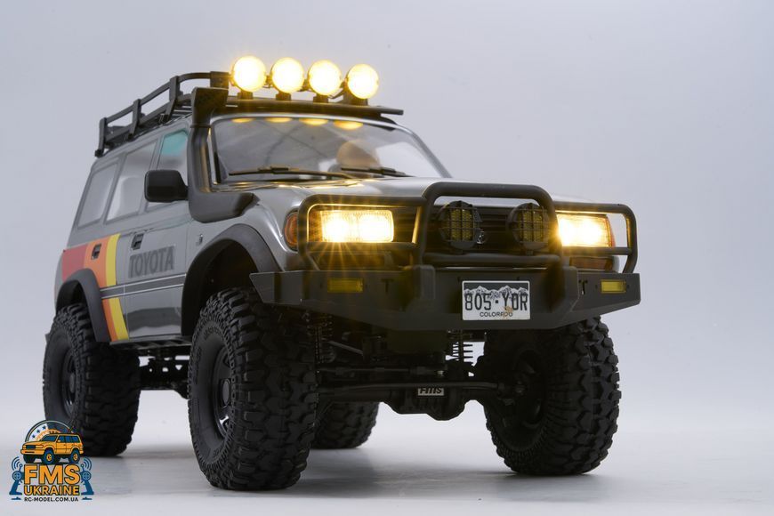Машинка на радіокеруванні FMS 1:10 FCX10 LC80 Toyota Land Cruiser 80 RTR FMS11042RSGY-SP фото