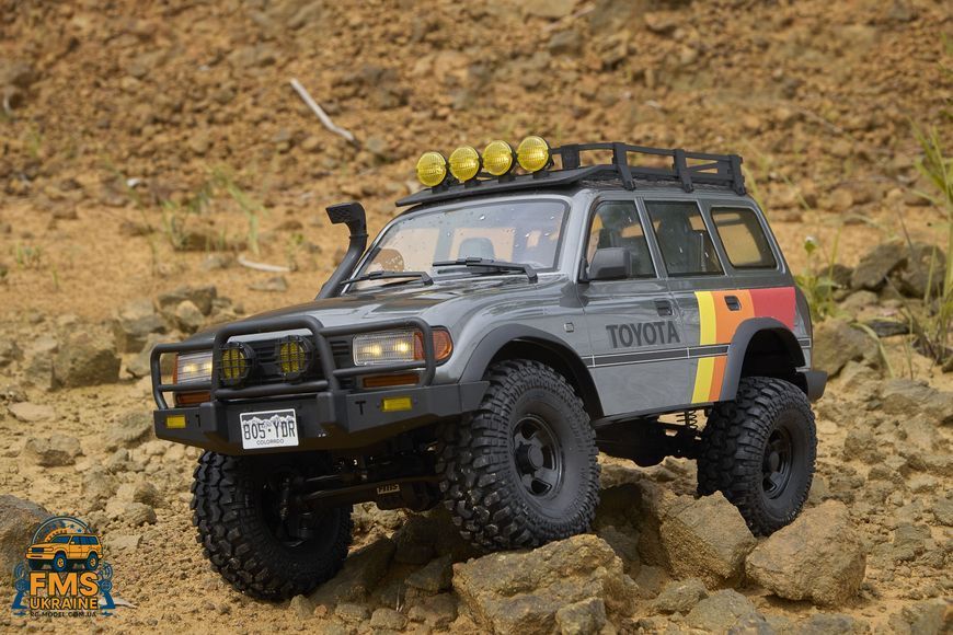 Машинка на радіокеруванні FMS 1:10 FCX10 LC80 Toyota Land Cruiser 80 RTR FMS11042RSGY-SP фото