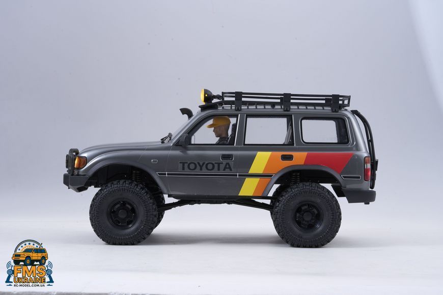 Машинка на радіокеруванні FMS 1:10 FCX10 LC80 Toyota Land Cruiser 80 RTR FMS11042RSGY-SP фото