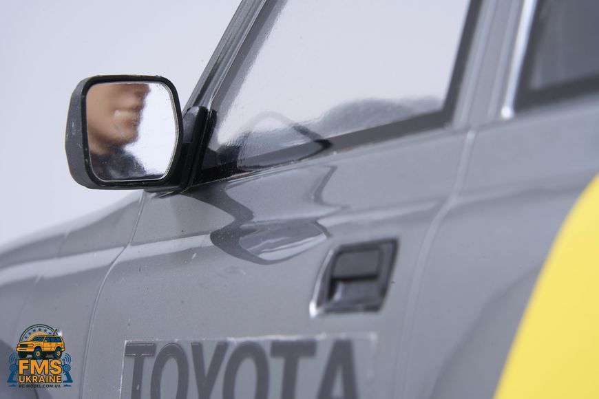 Машинка на радіокеруванні FMS 1:10 FCX10 LC80 Toyota Land Cruiser 80 RTR FMS11042RSGY-SP фото