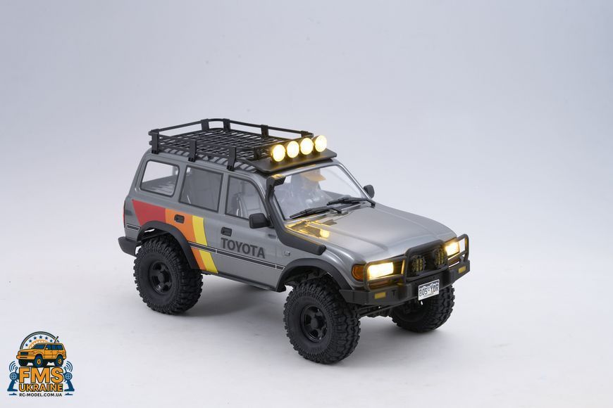Машинка на радіокеруванні FMS 1:10 FCX10 LC80 Toyota Land Cruiser 80 RTR FMS11042RSGY-SP фото