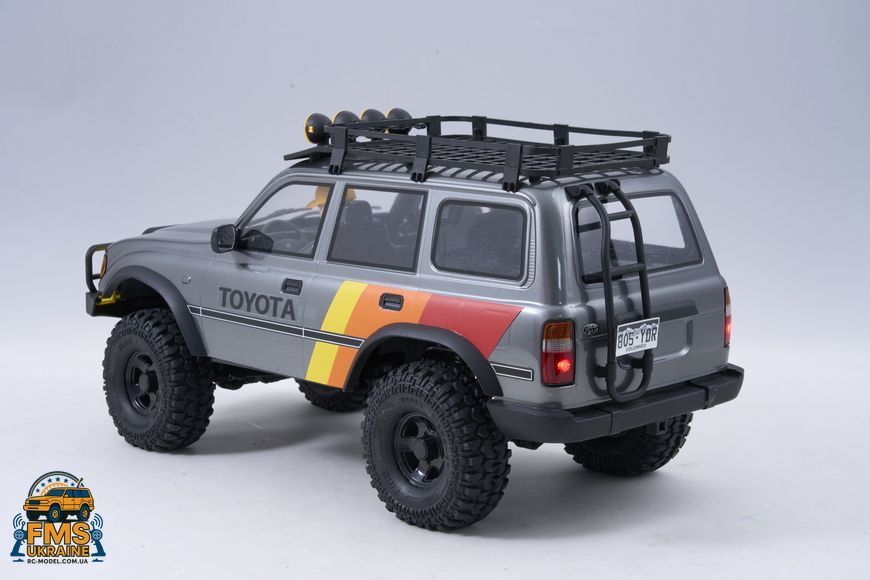 Машинка на радіокеруванні FMS 1:10 FCX10 LC80 Toyota Land Cruiser 80 RTR FMS11042RSGY-SP фото