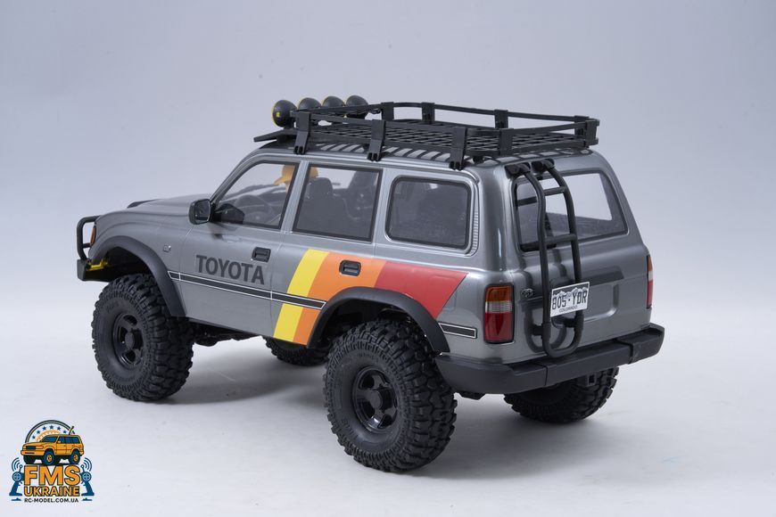Машинка на радіокеруванні FMS 1:10 FCX10 LC80 Toyota Land Cruiser 80 RTR FMS11042RSGY-SP фото