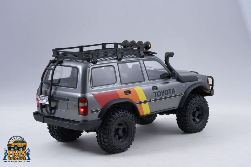 Машинка на радіокеруванні FMS 1:10 FCX10 LC80 Toyota Land Cruiser 80 RTR FMS11042RSGY-SP фото
