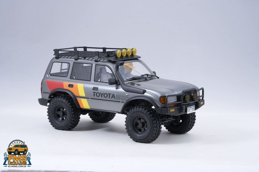 Машинка на радіокеруванні FMS 1:10 FCX10 LC80 Toyota Land Cruiser 80 RTR FMS11042RSGY-SP фото
