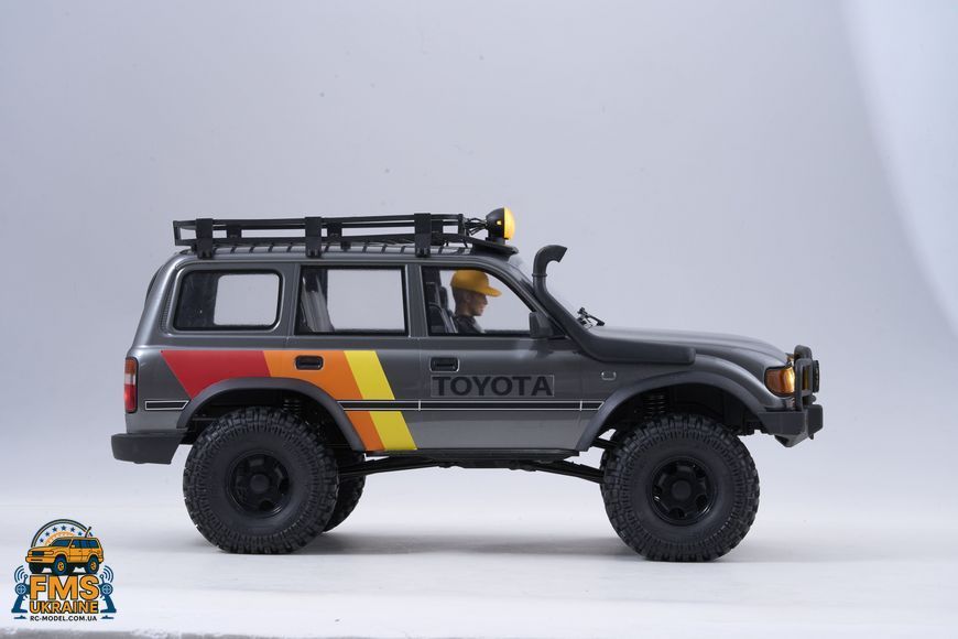 Машинка на радіокеруванні FMS 1:10 FCX10 LC80 Toyota Land Cruiser 80 RTR FMS11042RSGY-SP фото