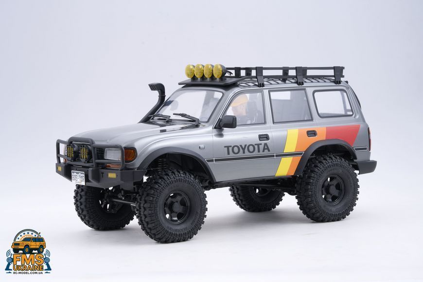 Машинка на радіокеруванні FMS 1:10 FCX10 LC80 Toyota Land Cruiser 80 RTR FMS11042RSGY-SP фото