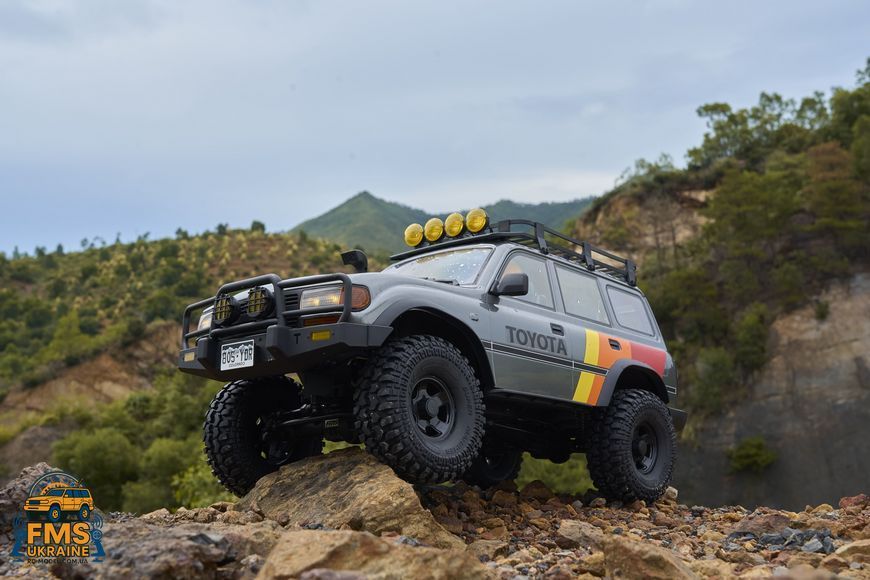 Машинка на радіокеруванні FMS 1:10 FCX10 LC80 Toyota Land Cruiser 80 RTR FMS11042RSGY-SP фото