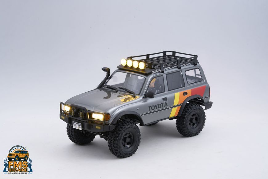 Машинка на радіокеруванні FMS 1:10 FCX10 LC80 Toyota Land Cruiser 80 RTR FMS11042RSGY-SP фото